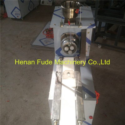 China Automatic pouring oil twist making machine,fried dough twist making machine,Chinese doughnut making machine supplier
